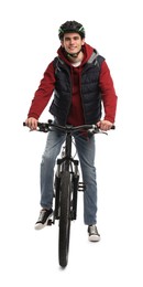 Photo of Smiling man in helmet riding bicycle on white background