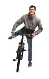 Photo of Smiling man with bicycle isolated on white