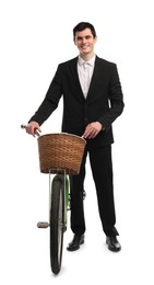 Smiling man with bicycle and basket isolated on white