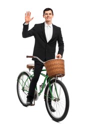 Photo of Smiling man with bicycle and basket isolated on white