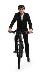 Smiling man in helmet riding bicycle on white background