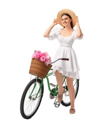 Photo of Smiling woman on bicycle with basket of peony flowers against white background