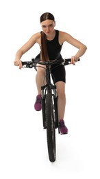 Beautiful young woman riding bicycle on white background