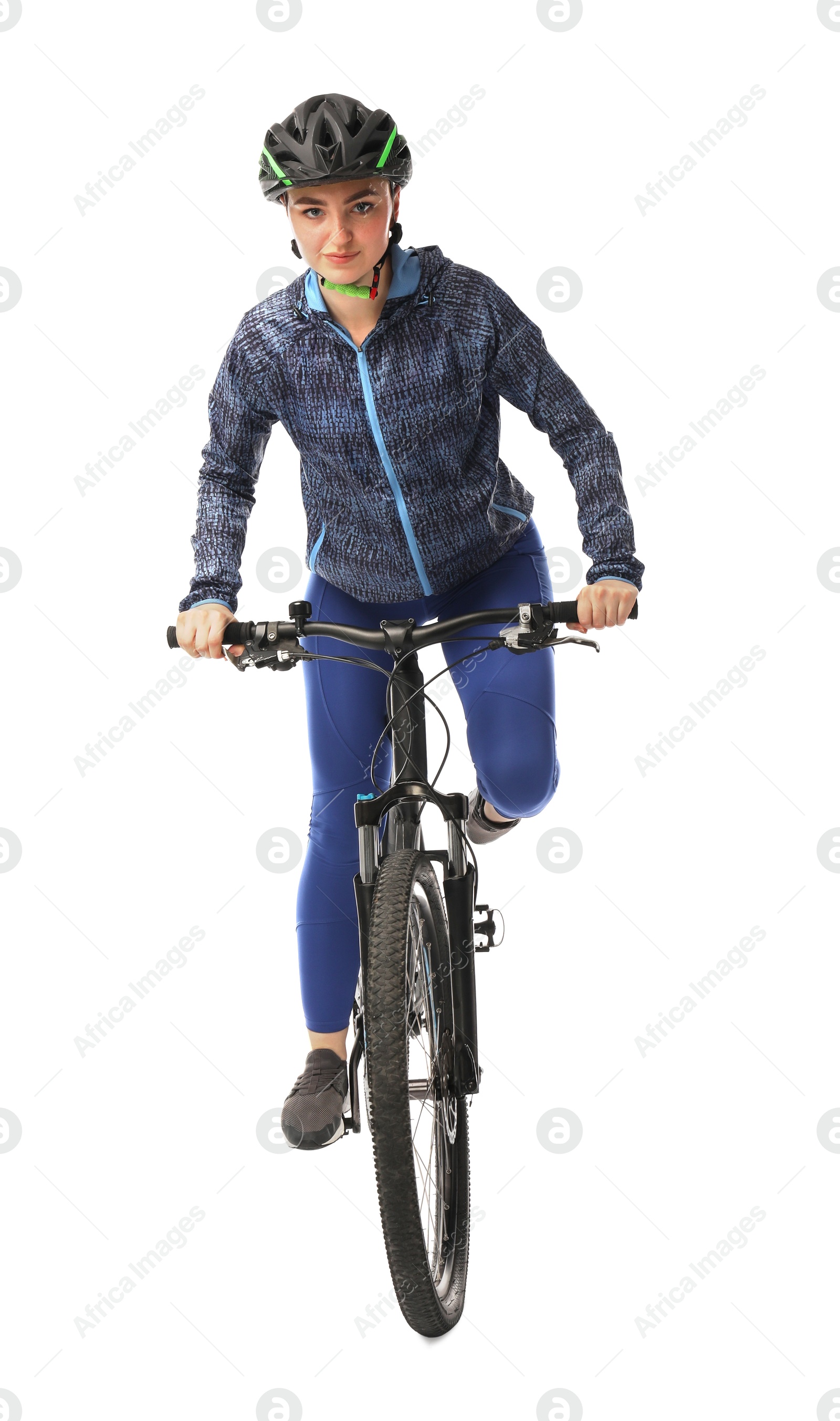 Photo of Beautiful young woman in helmet riding bicycle on white background