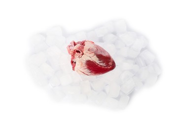 Photo of Heart and ice cubes on white background, top view