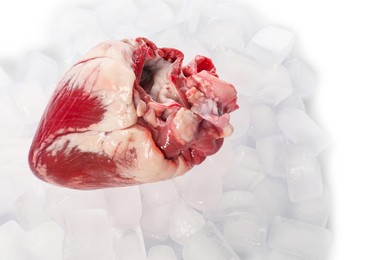 Heart with ice cubes on white background, top view