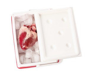 Heart with ice in fridge on white background, top view