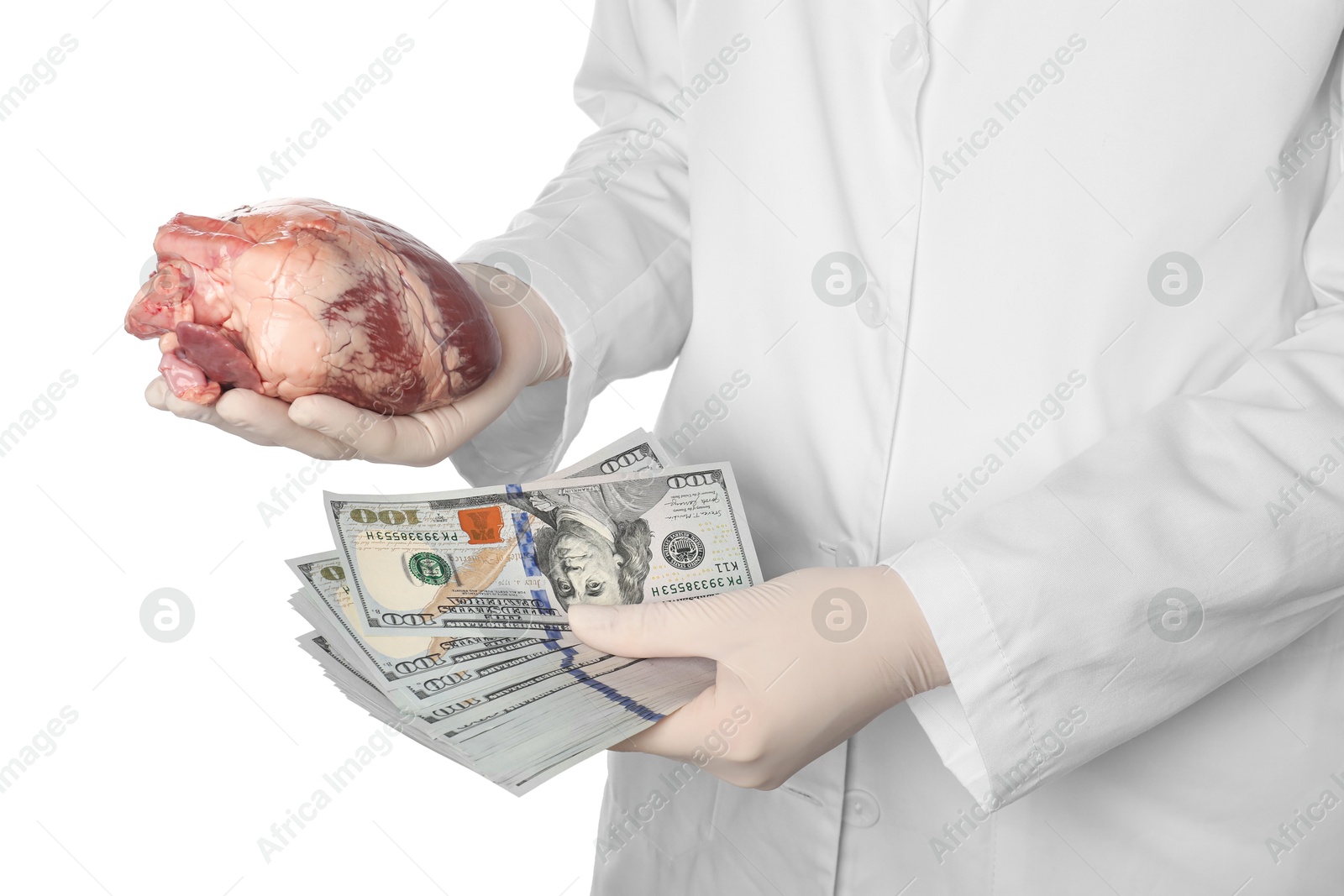 Photo of Doctor with heart and dollar banknotes on white background, closeup