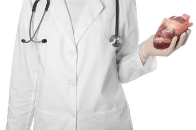 Photo of Doctor with heart on white background, closeup