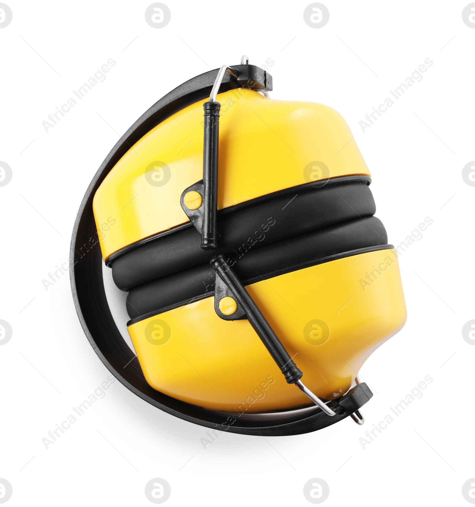 Photo of Yellow earmuffs isolated on white, top view. Safety equipment