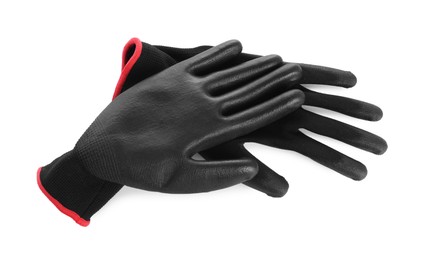 Photo of Protective gloves isolated on white. Safety equipment