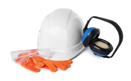 Photo of Hard hat, protective gloves, goggles and earmuffs isolated on white