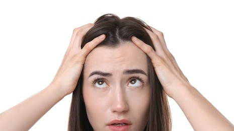 Photo of Sad woman with hair loss problem on white background, closeup