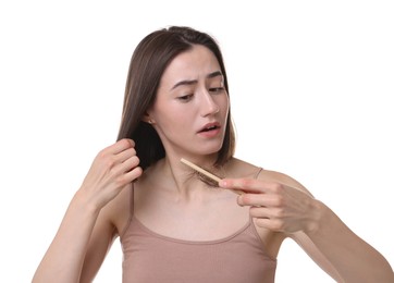 Sad woman with hair loss problem on white background