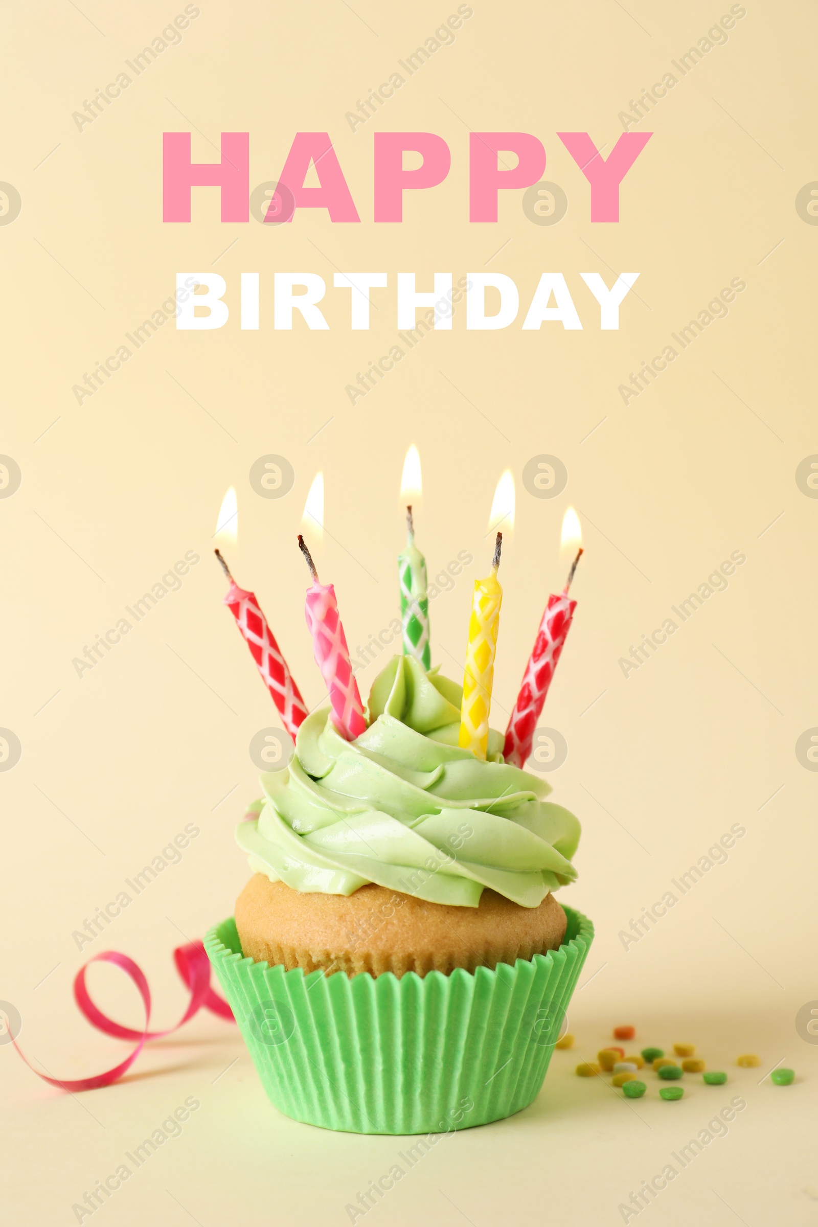 Image of Birthday cupcake with candles on beige background. Greeting card