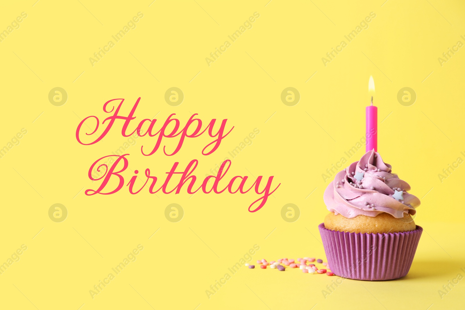 Image of Birthday cupcake with candle on yellow background. Greeting card