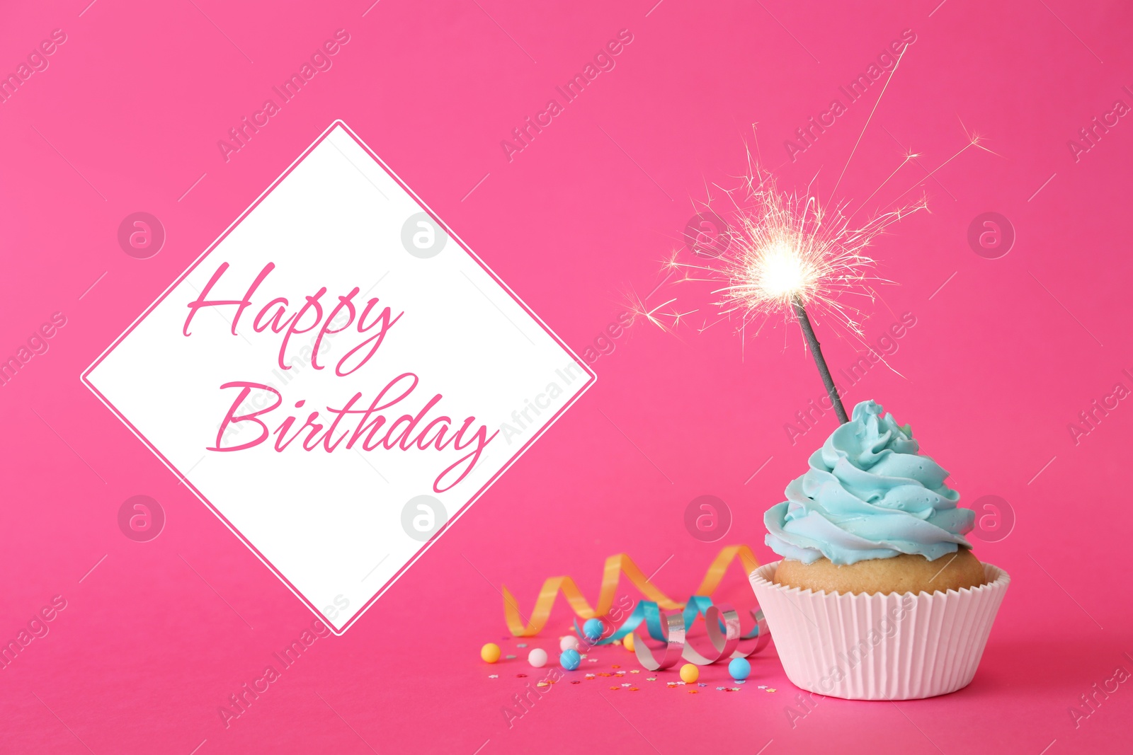 Image of Birthday cupcake with sparkler on pink background. Greeting card