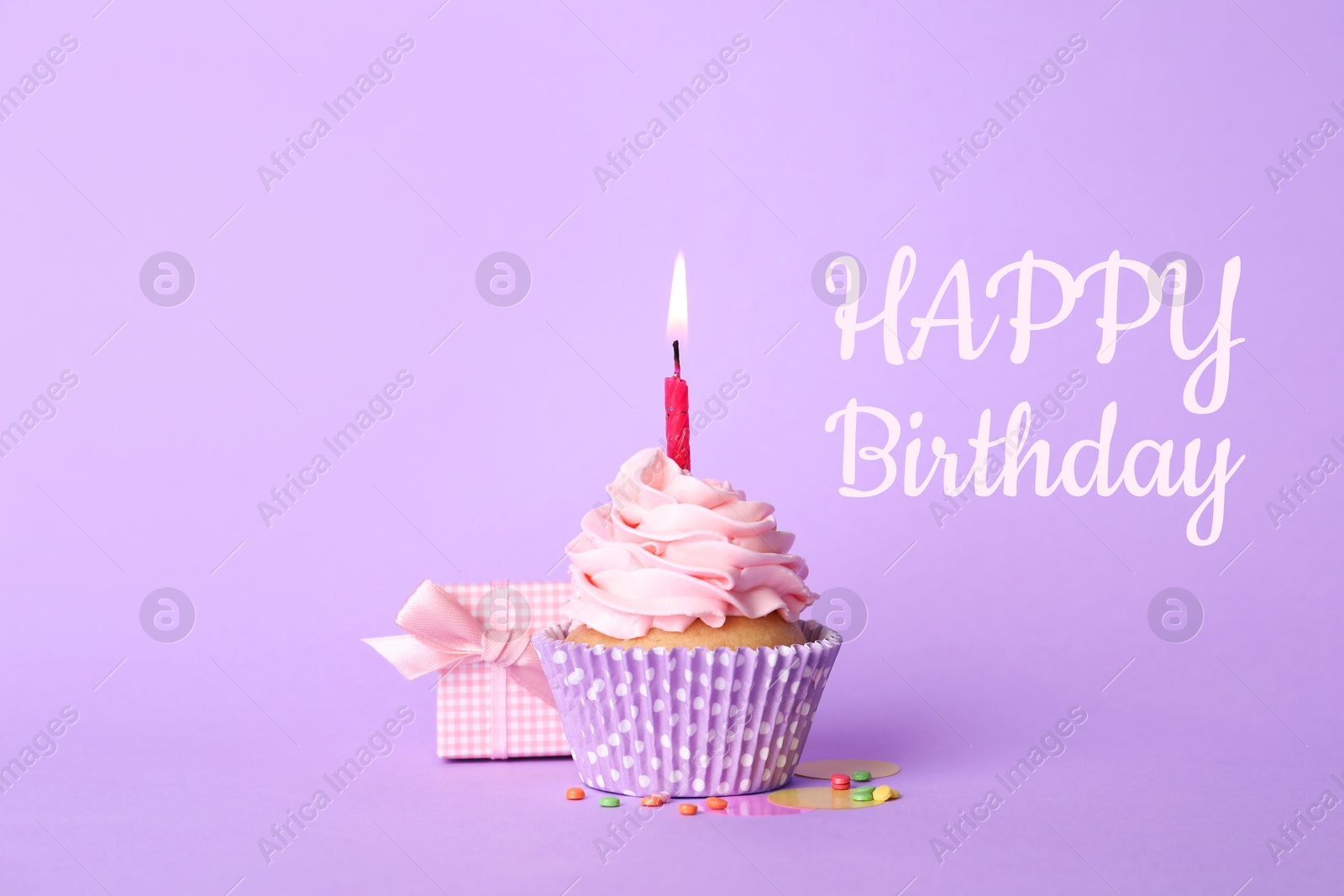 Image of Birthday card with cupcake and gift box on violet background