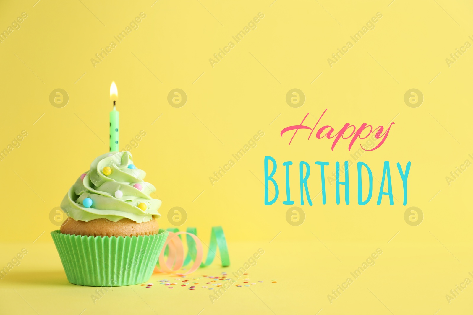 Image of Birthday cupcake with candle on yellow background. Greeting card