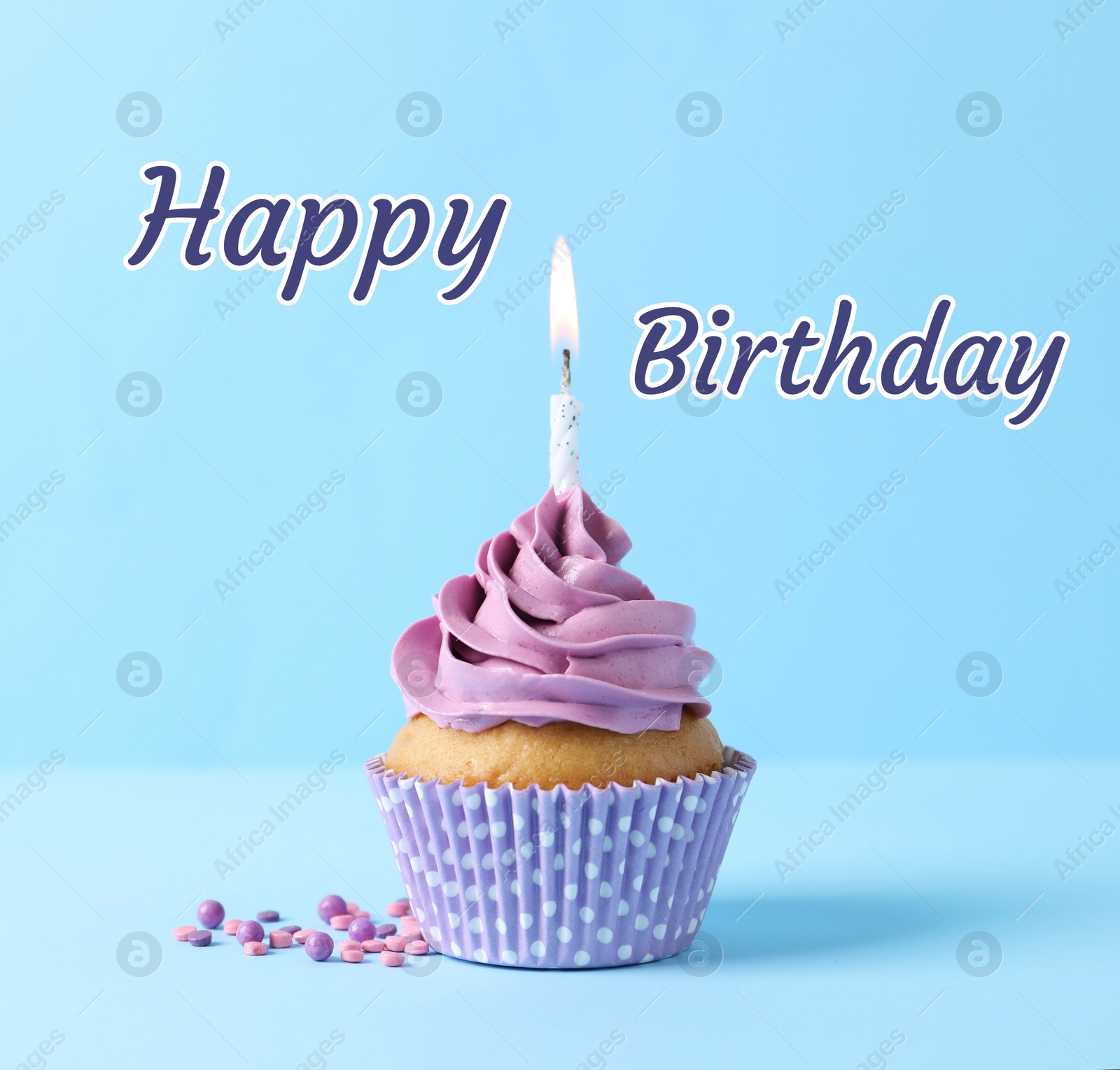 Image of Birthday cupcake with candle on light blue background. Greeting card