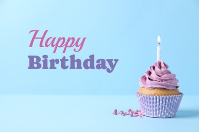 Image of Birthday cupcake with candle on light blue background. Greeting card