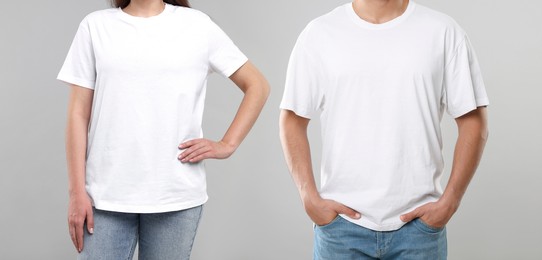Image of Woman and man wearing white t-shirts on white background, closeup. Collage of photos