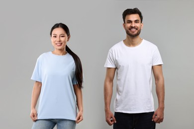 Image of Woman and man wearing t-shirts on grey background, collage of photos