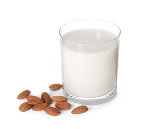 Photo of Glass of almond milk and almonds isolated on white