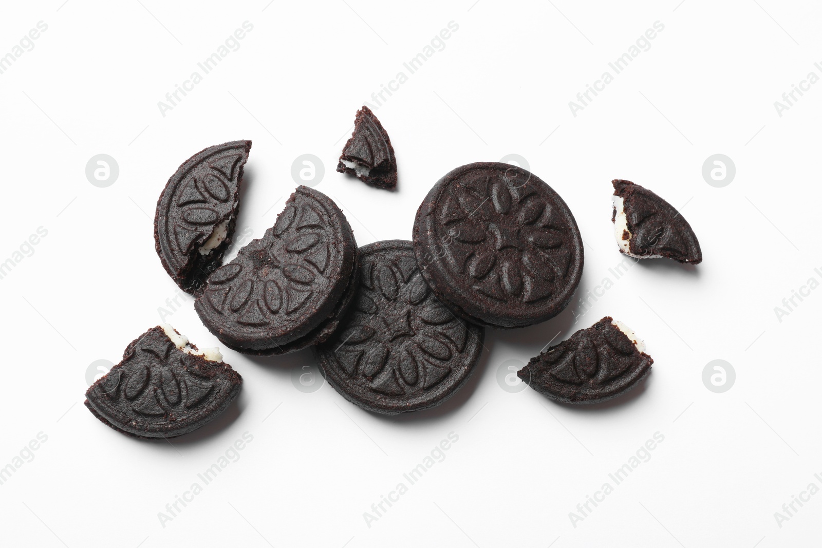 Photo of Tasty sweet sandwich cookies on white background, flat lay