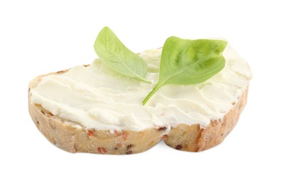 Photo of Piece of bread with cream cheese and basil leaves isolated on white