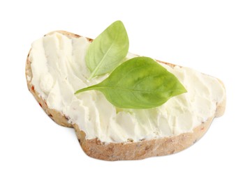 Photo of Piece of bread with cream cheese and basil leaves isolated on white