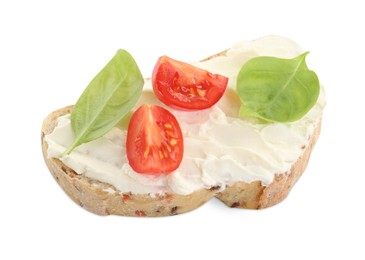 Photo of Piece of bread with cream cheese, basil leaves and tomato isolated on white