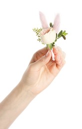 Photo of Woman holding stylish boutonniere on white background, closeup