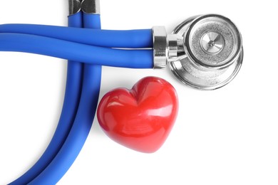 Stethoscope and red heart isolated on white, top view