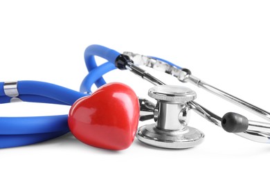 Photo of Stethoscope and red heart isolated on white