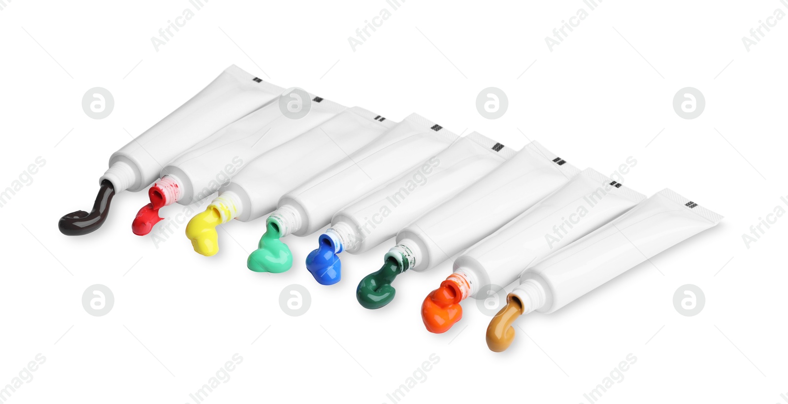 Photo of Tubes with colorful paints isolated on white