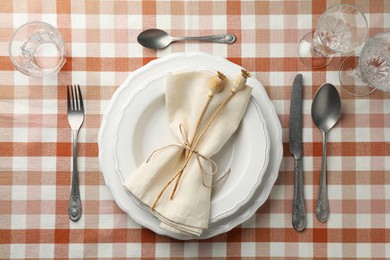 Photo of Stylish setting with cutlery and plates on table, flat lay