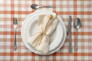 Photo of Stylish setting with cutlery and plates on table, flat lay
