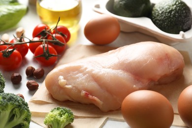 Many different healthy food on white table, closeup