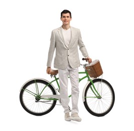 Smiling man with bicycle and basket isolated on white