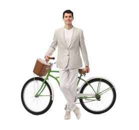 Smiling man with bicycle and basket isolated on white