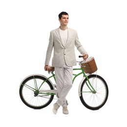 Photo of Smiling man with bicycle and basket isolated on white