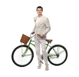 Smiling man with bicycle and basket isolated on white