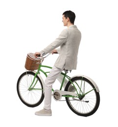 Man riding bicycle with basket isolated on white