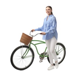 Smiling woman with bicycle and basket isolated on white
