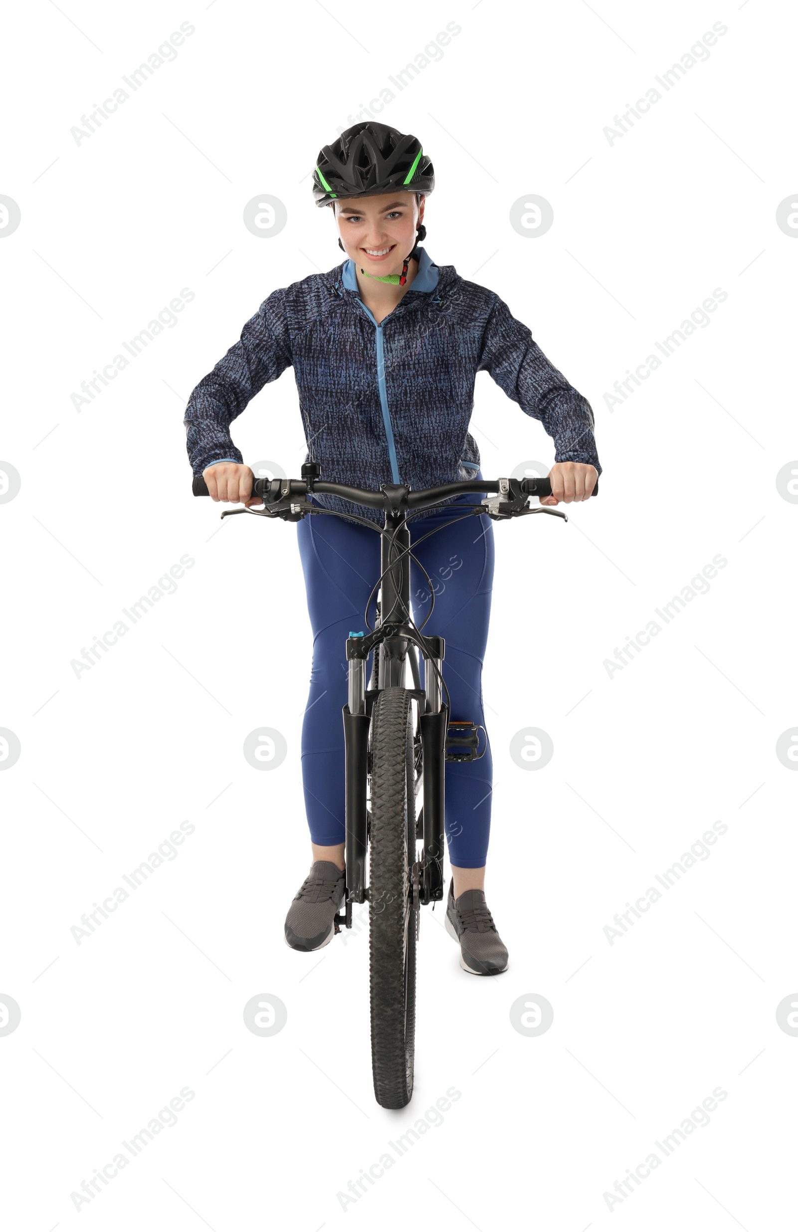 Photo of Smiling woman in helmet riding bicycle on white background