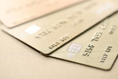 Photo of Different credit cards on table, closeup view