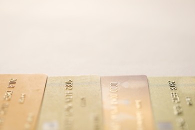 Many credit cards on gray background, closeup. Space for text