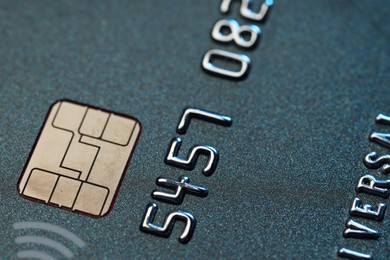 Photo of One credit card as background, macro view