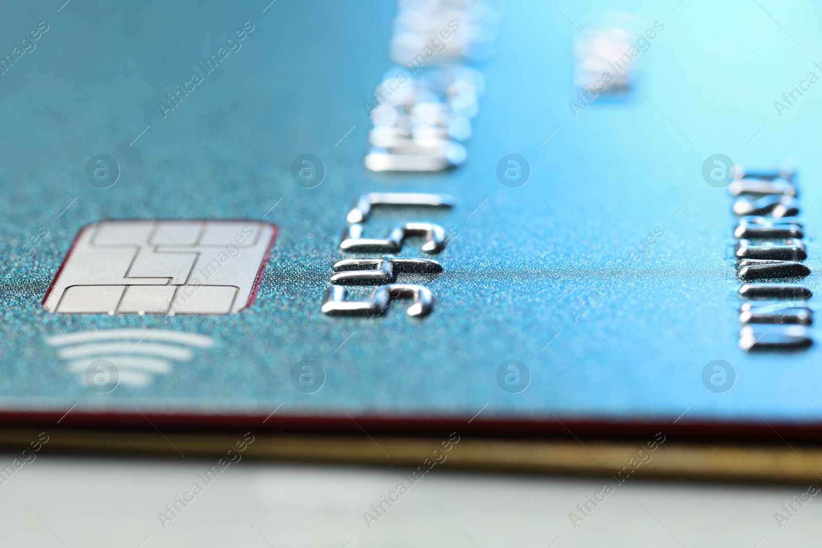 Photo of Credit cards on gray table, macro view